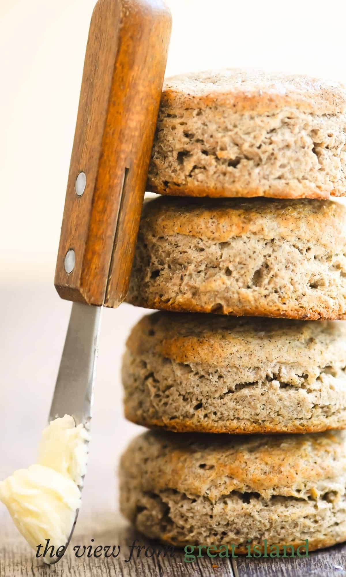 a stack of buckwheat biscuits with a butter knife.