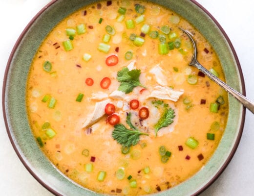 Thai coconut soup in a bowl with spoon