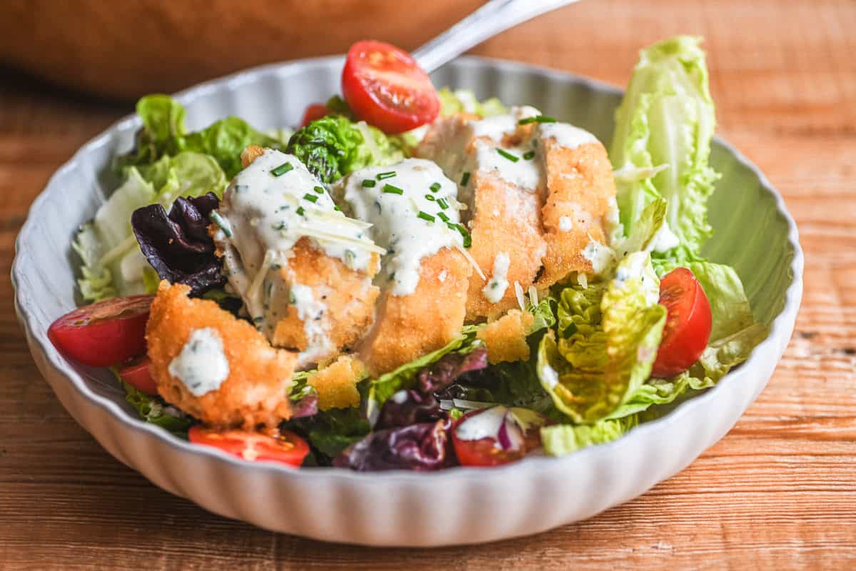 Chicken salad with buttermilk dressing on a plate.