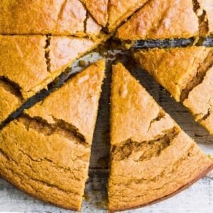 pumpkin cornbread sliced into thick wedges.