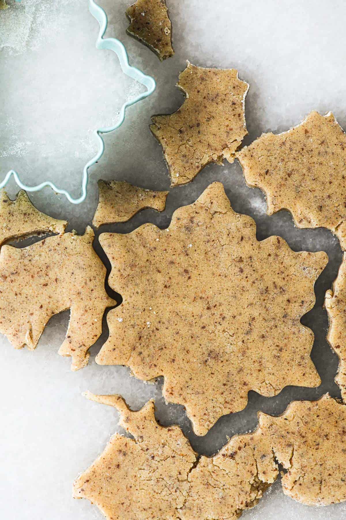 speculoos cookie dough and cookie cutter.