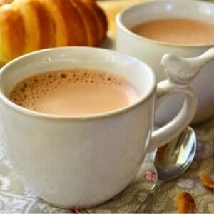 French press drinking chocolate in pretty white mugs.