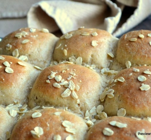Quick Whole Grain Oat Rolls on a cooling rack