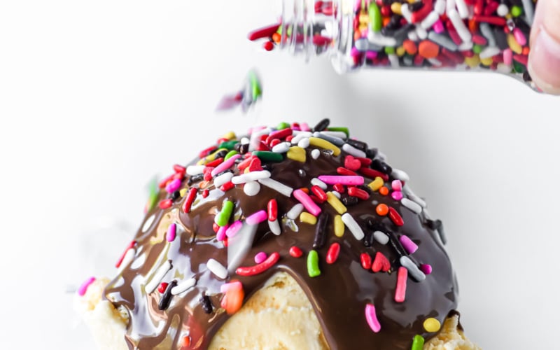 Nutella Magic Shell on ice cream, with sprinkles.