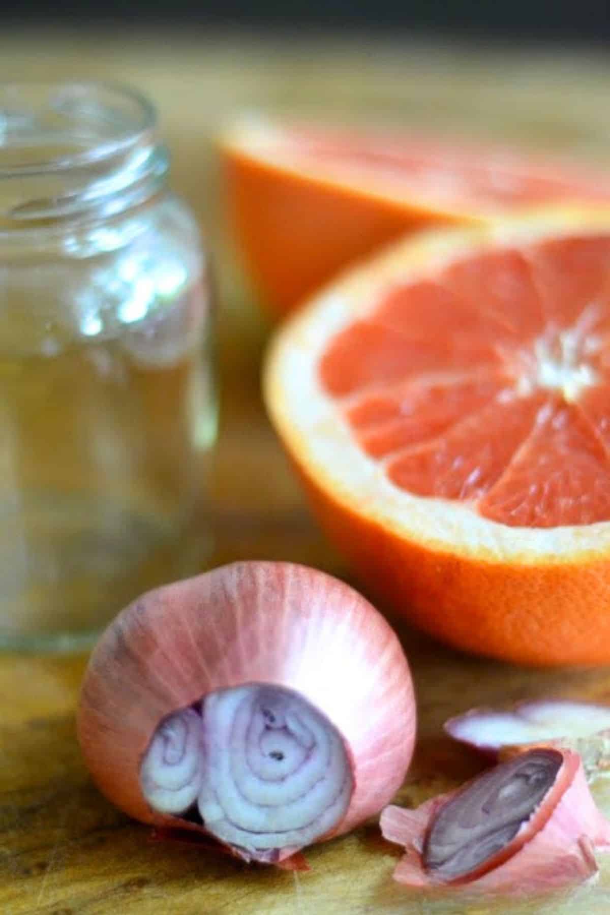 Making shallot pink grapefruit dressing.