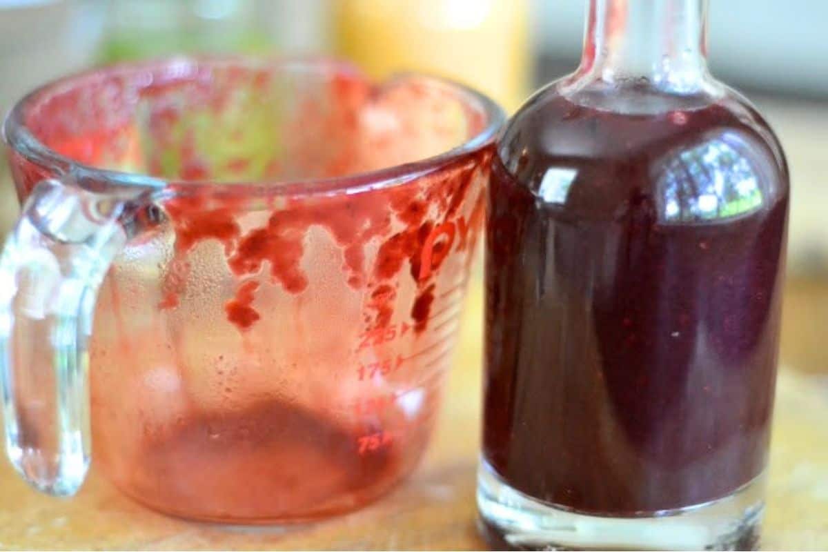 Homemade blackberry vinegar, in a jar.