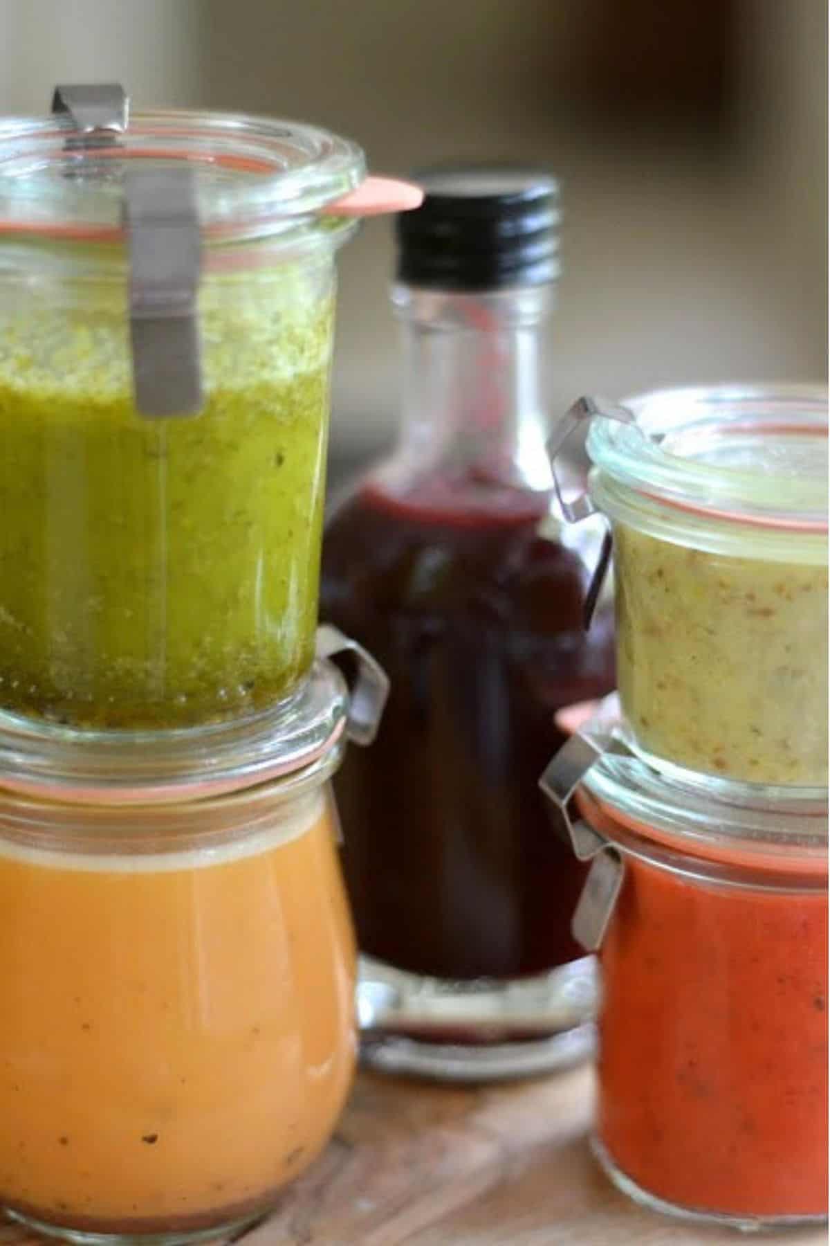 5 homemade fruity salad dressings, in recycled bottles.