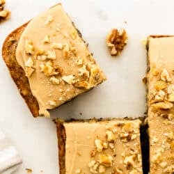 Banana Cake with Caramel Frosting cut into squares