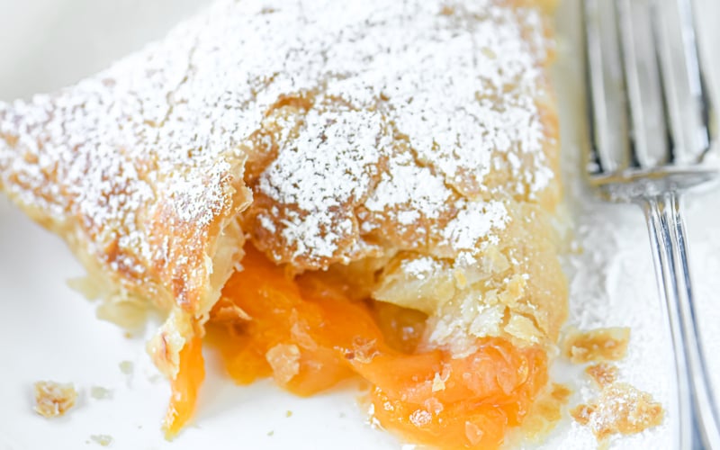 apricot turnover topped with powdered sugar