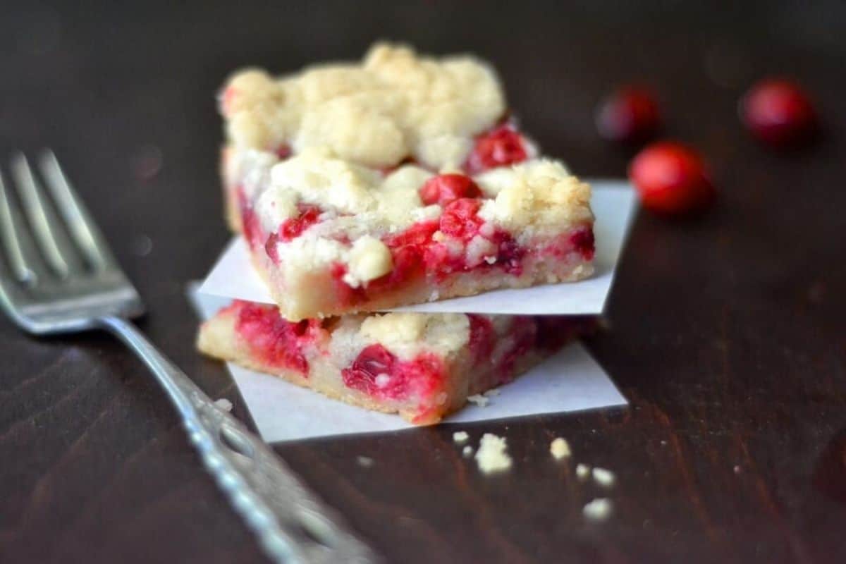 fresh cranberry bars with bright red cranberries.