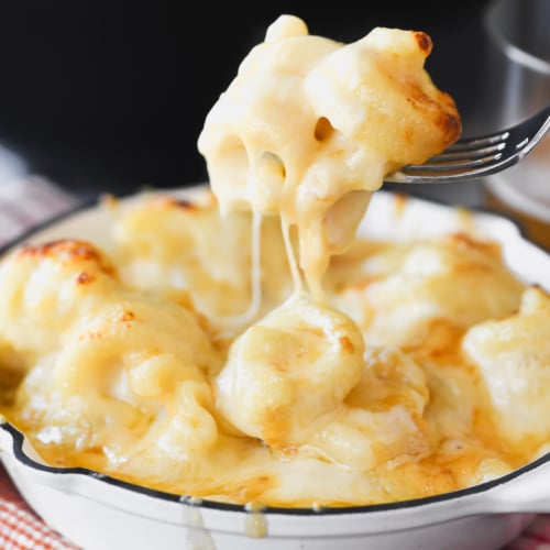 Taking a forkful of Smoked Gouda Mac and Cheese.