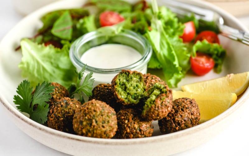 serving falafel with tahini sauce