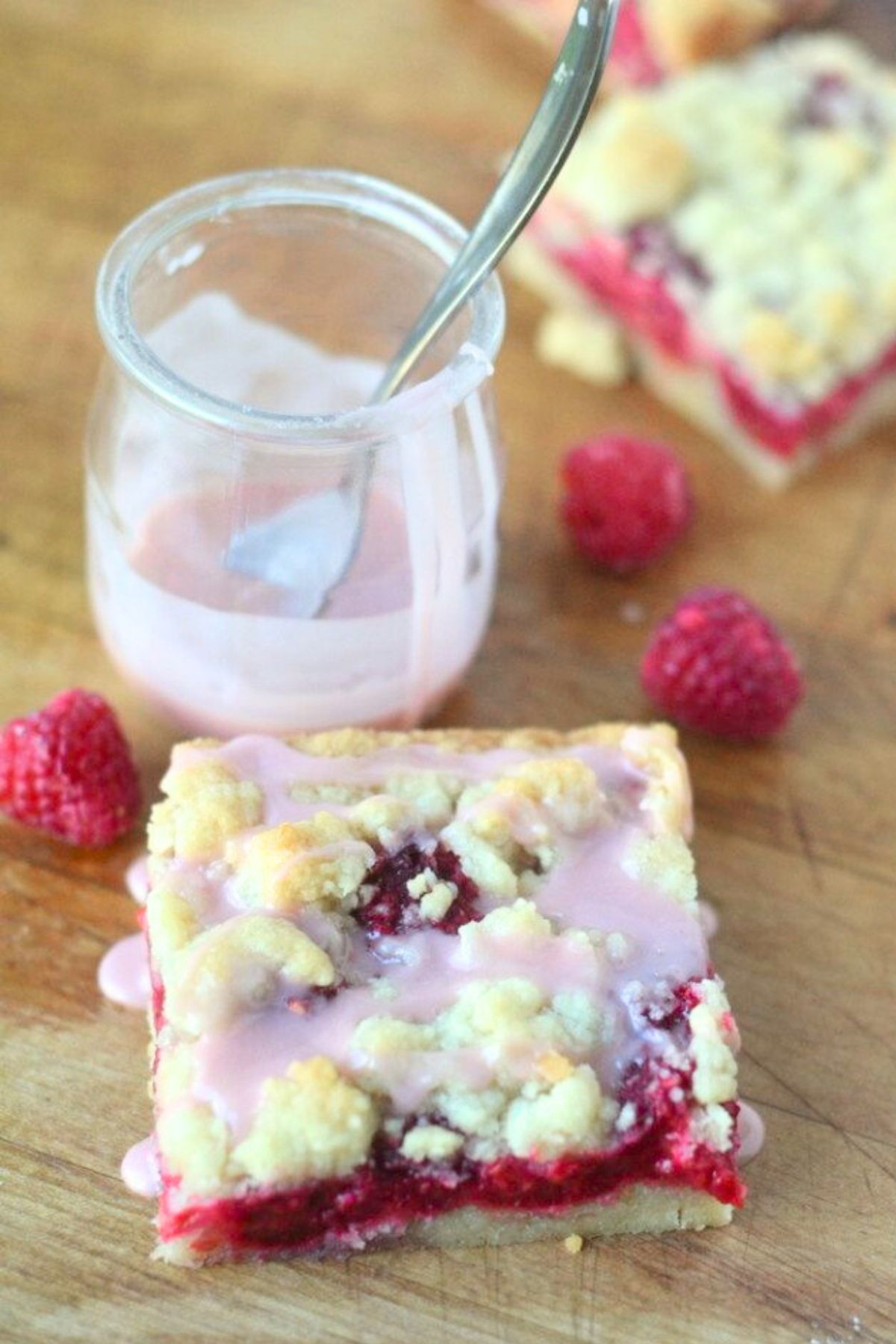 raspberry Chambord bar with pink glaze in a jar.