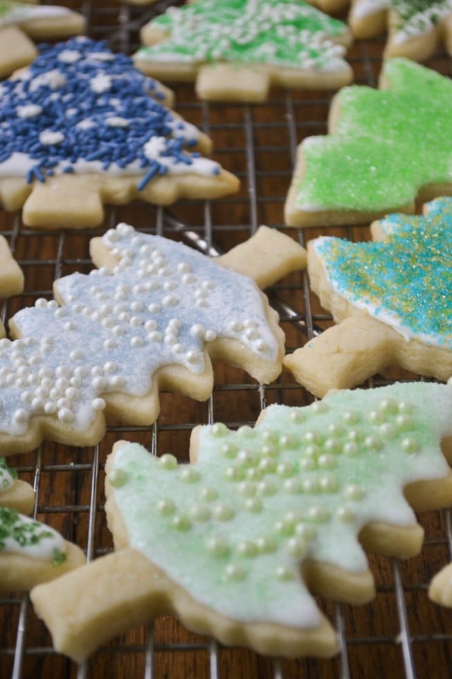 decorated sugar cookies cooling on a rack