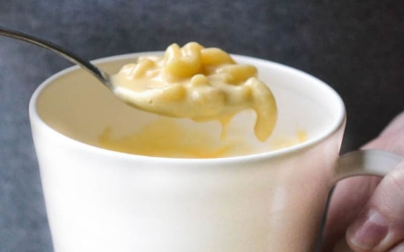 A spoonful of microwave mac and cheese for one.