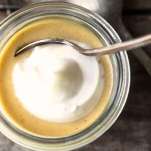 small jar of salted maple pot de creme with spoon.