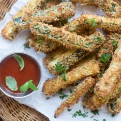 Healthy and crisp Baked Zucchini Fries with a fresh tomato dipping sauce --- theviewfromgreatisland.com