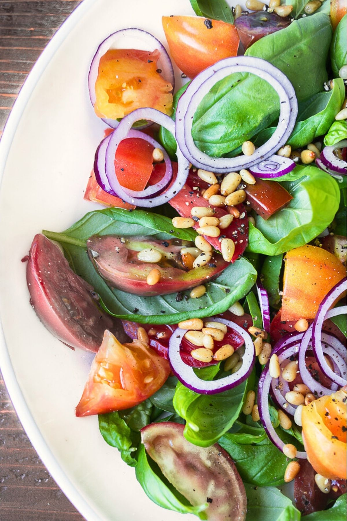 basil salad in a white salad bowl.