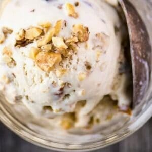 Maple walnut ice cream in a bowl with spoon.