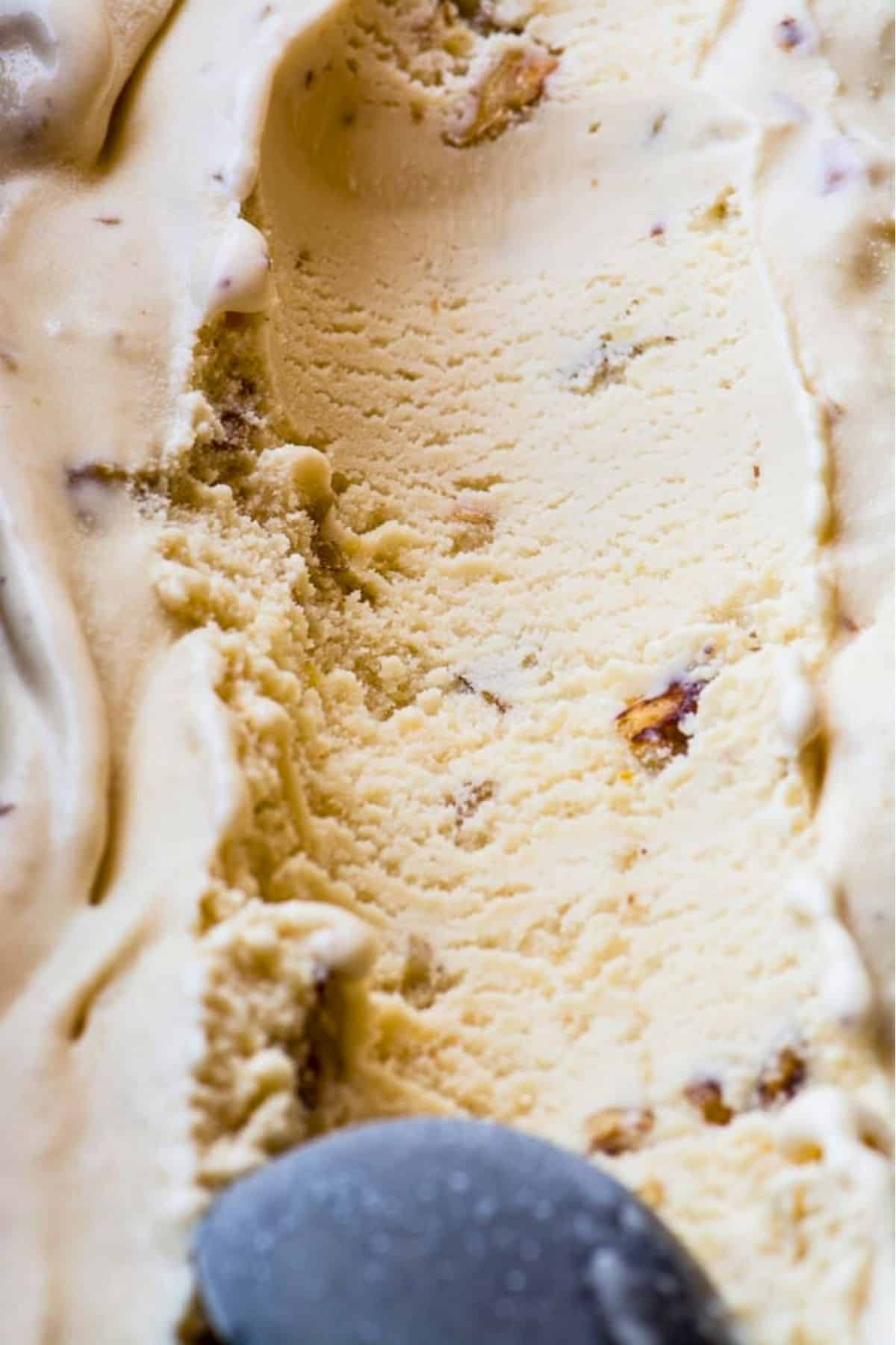 Homemade maple walnut ice cream in a loaf pan.
