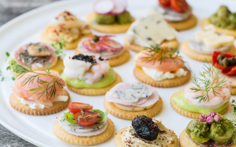 Easy Springtime RITZ Cracker Canapés ~ celebrate the return of warmer weather with a collection of colorful toppings on crisp Ritz crackers...layer them up and watch them disappear!