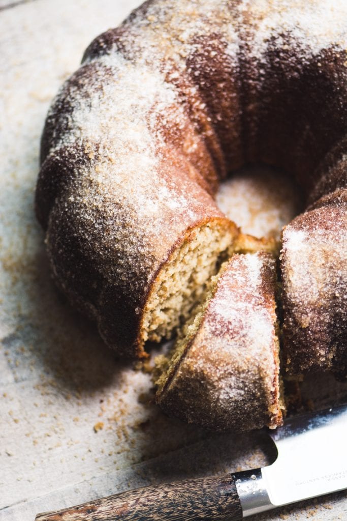 apple cider doughnut bundt cake with slice removed