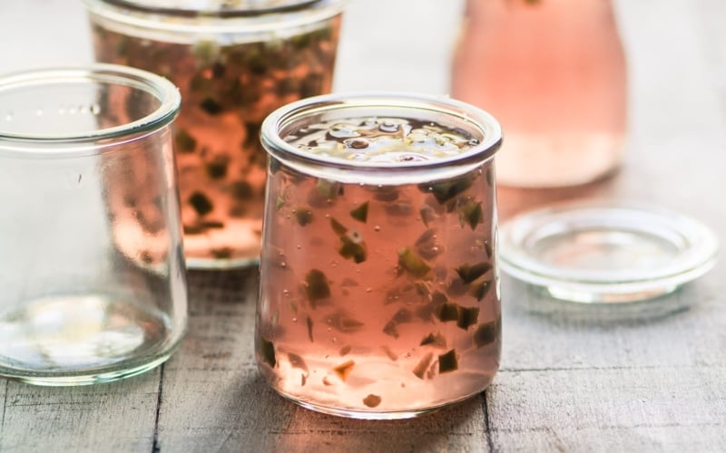 Jar of rose wine hot pepper jelly.