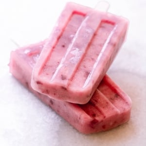 a stack of two white peach popsicles