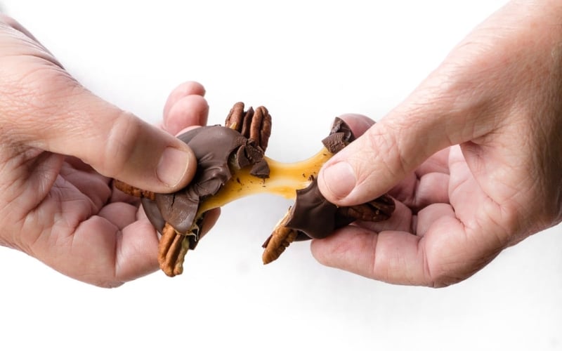 Breaking apart a homemade turtle candy