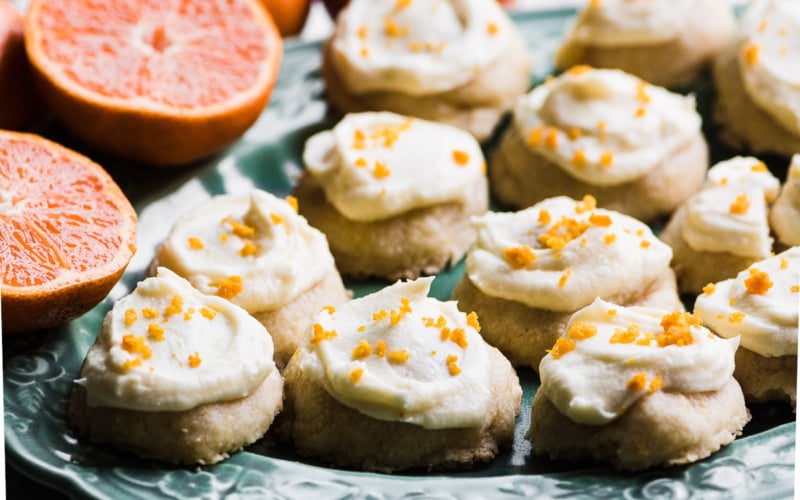 Clementine Melting Moments on a green plate with a cut clementine