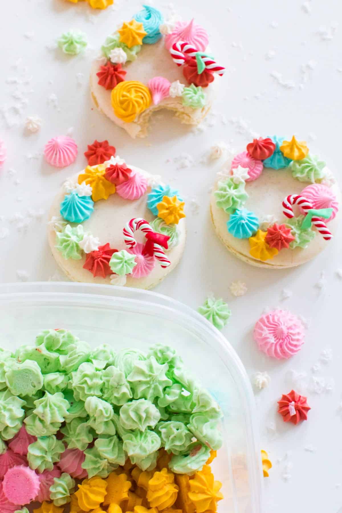 12 Days of Holiday Meringues! ย Meringues might just be the perfect holiday treat ~ easy, pretty, gluten free, and light enough to leave room for all the other holiday cookies! #cookies, #Christmas #easy #recipe #glutenfree #kisses #desserts #howtomake #french #italian wreath meringues