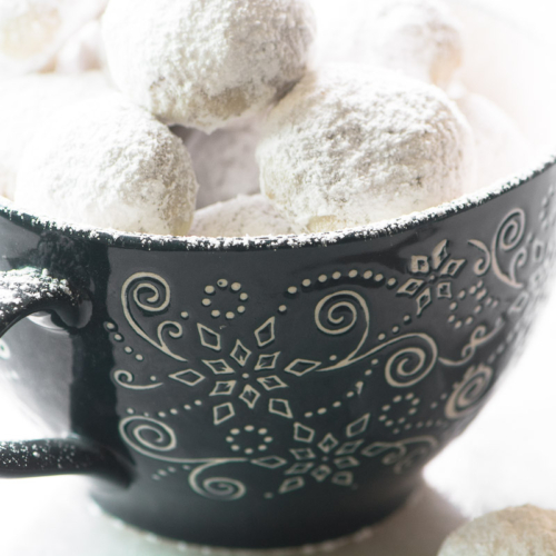 Toasted Almond Russian Tea Cakes in a mug