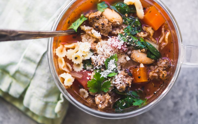 a mug of Italian Sausage and Bean Soup