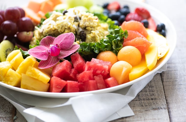 Great Island Salad Plate in a white bowl with chicken salad and mixed fruit