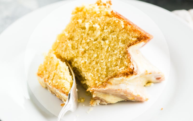 a slice of orange blossom bundt cake