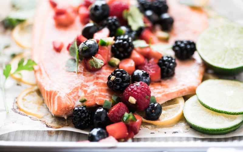 Roasted salmon topped with berry salsa