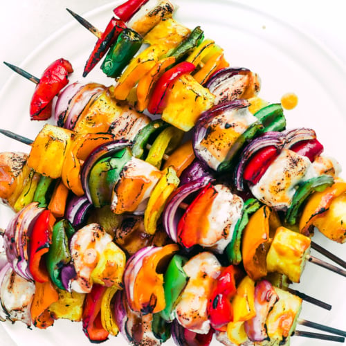 Sweet Fire Chicken Skewers fanned out on a plate