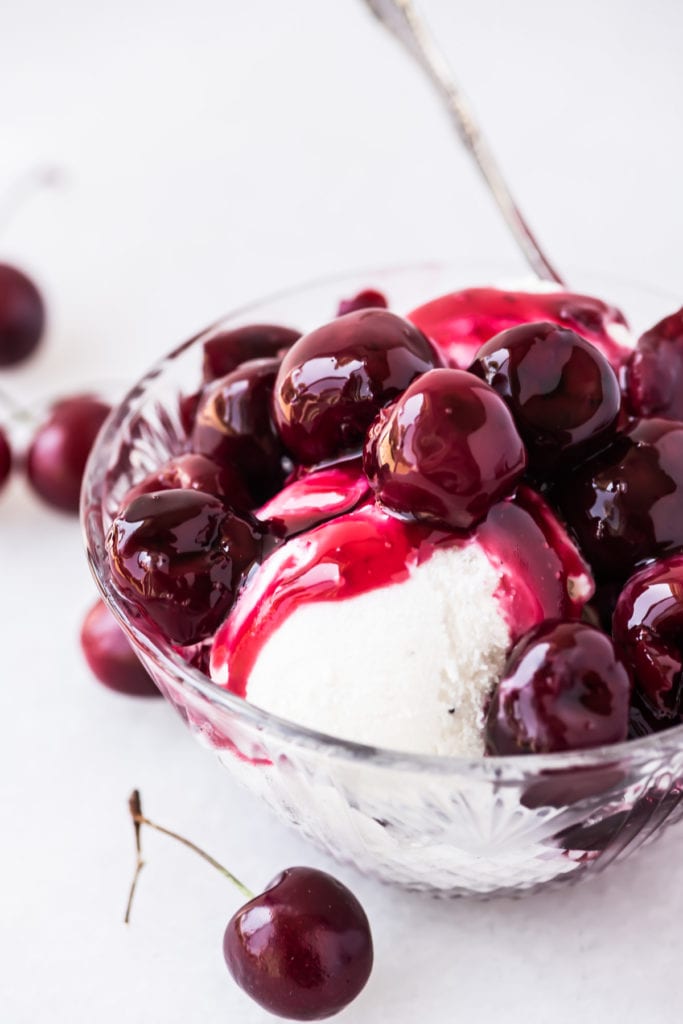 Fresh cherry sauce on vanilla ice cream