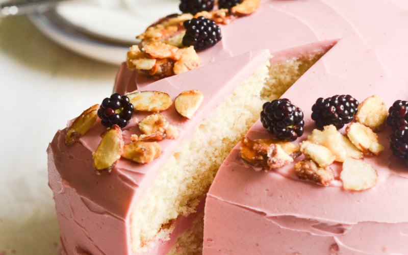 almond cake with blackberry buttercream frosting