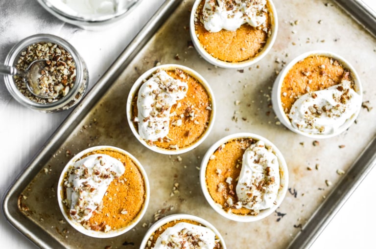 warm pumpkin pudding cakes on a baking sheet