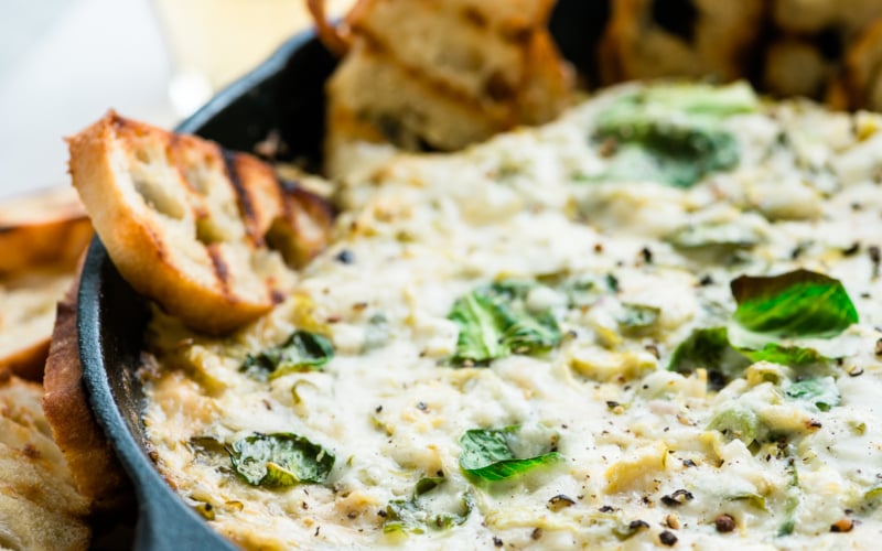 Cheesy Brussels Sprout dip in a skillet