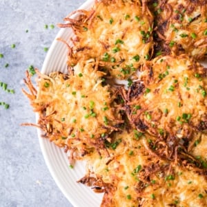 a platter of fresh made potato latkes