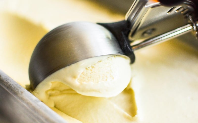 honey vanilla ice cream being scooped