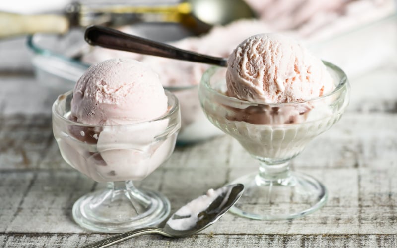 Homemade rhubarb ice cream in small glass dishes
