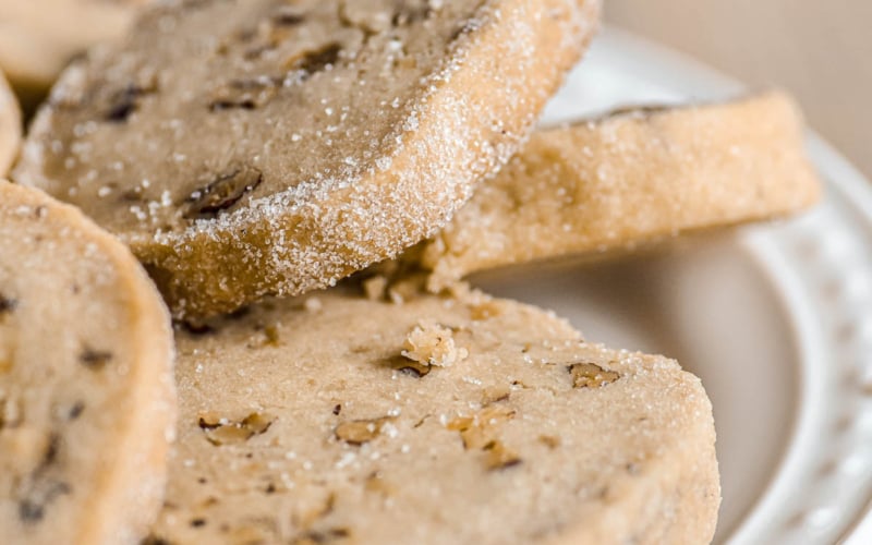 a plate of pecan sandies cookies.