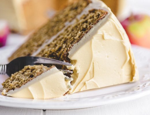 Diving into a slice of apple cake with a fork