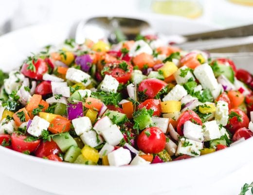 Israeli salad in a white bowl