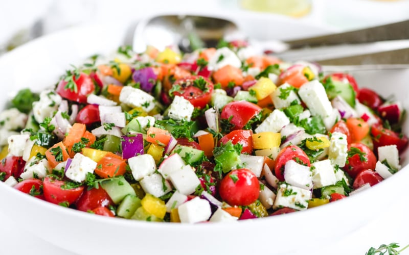 Israeli salad in a white bowl