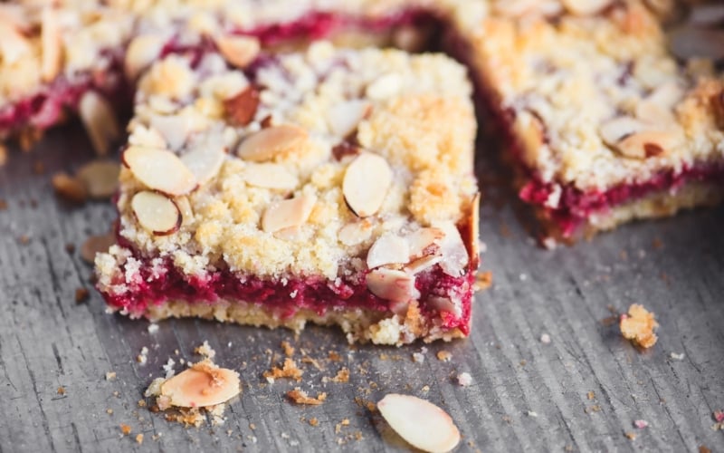 raspberry almond bars in a pan