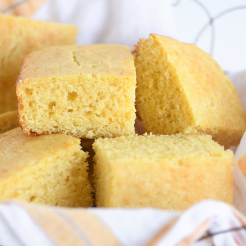 Cornbread pieces in a basket.